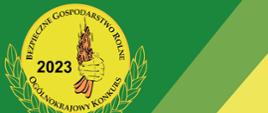 Zdjęcie przedstawia, na żółto-zielonym tle, żółte logo wydarzenia z napisem "Ogólnokrajowy konkurs Bezpieczne Gospodarstwo Rolne 2023", oraz dłonią trzymającą zboża".