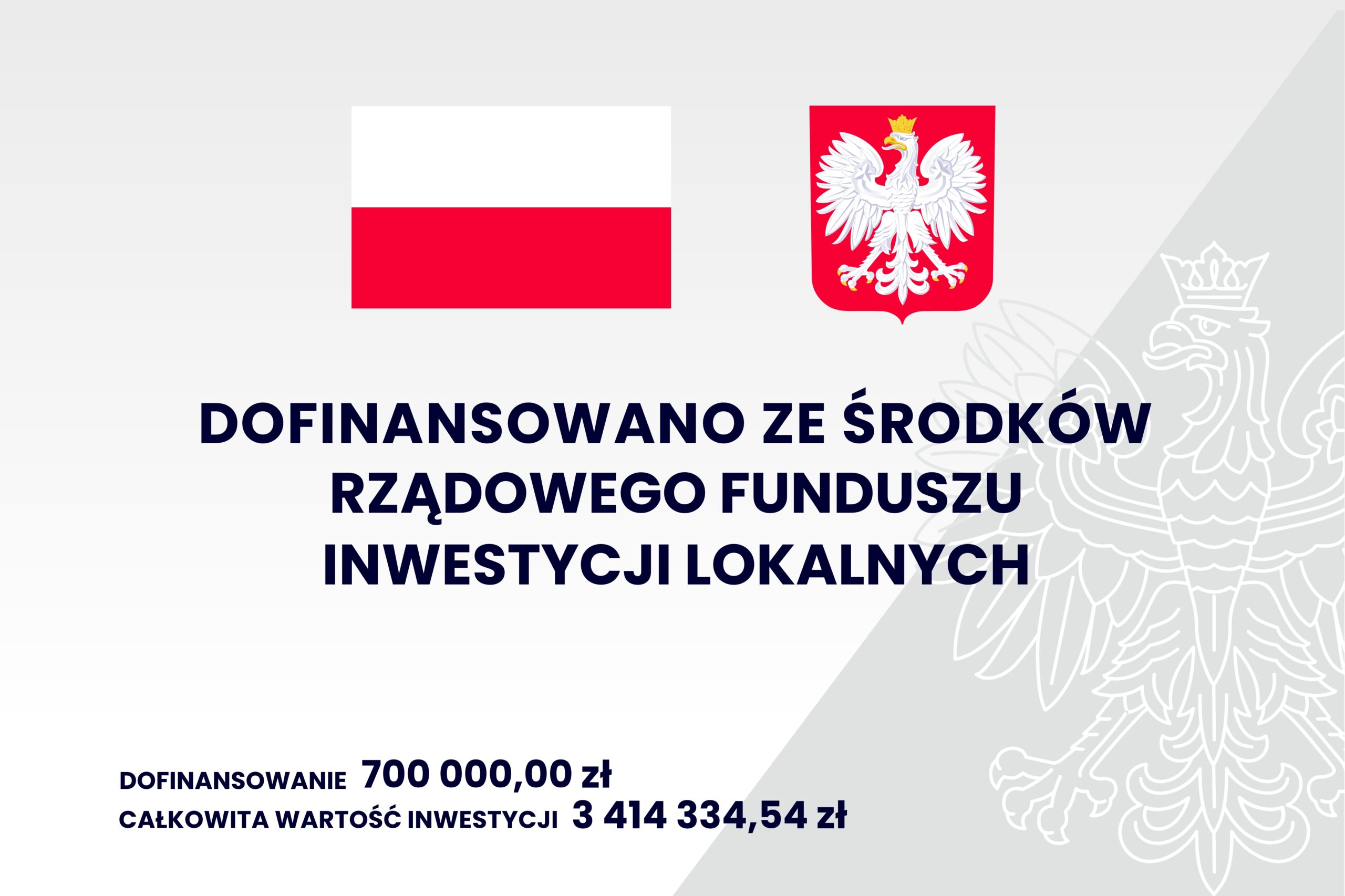 Grafika przedstawia informacje: dofinansowano ze środków rządowego funduszu inwestycji lokalnych; dofinansowanie - 700 000,00 zł; całkowita wartość inwestycji -3 414 334,54 zł; na górze jest flaga i godło Polski