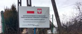Droga Łękawica Od Lipy do Rynku - zdjęcie tablicy informującej o dofinansowaniu z Funduszu Dróg Samorządowych