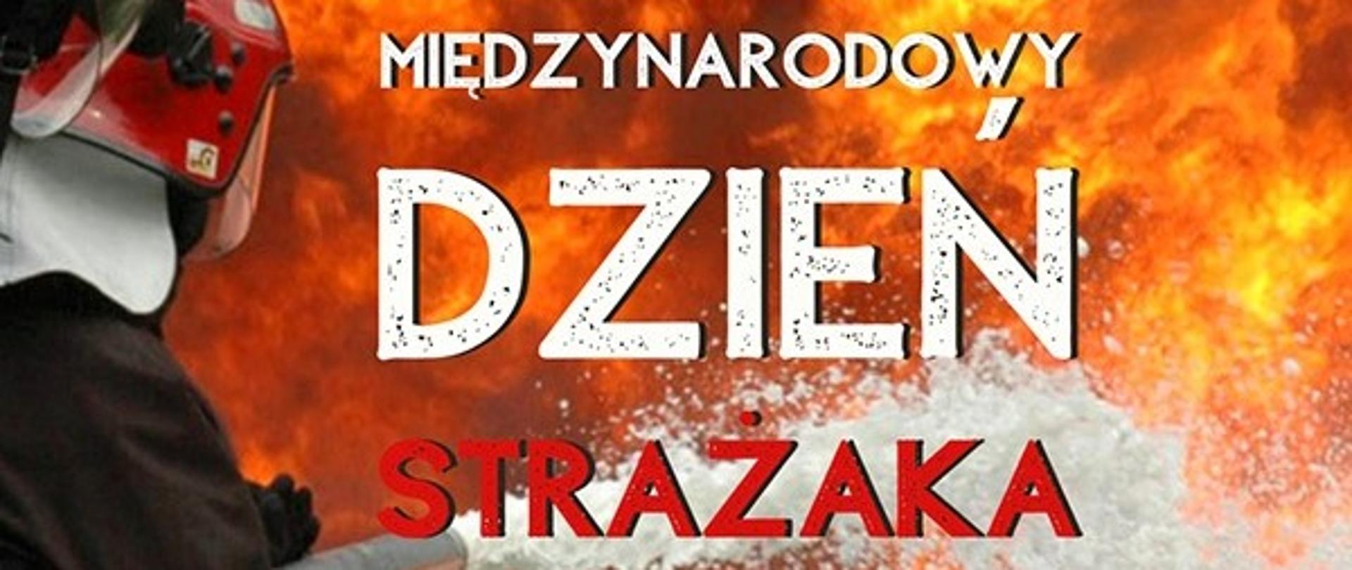 Baner przedstawiający strażaka gaszącego ogień oraz napis 4 Maj Międzynarodowy Dzień Strażaka