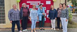 Przedstawiciele organizatora pozują do zdjęcia