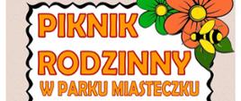 pomarańczowy napis piknik rodzinny w parku miasteczku 