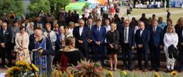 Folklor i Tożsamość Pogranicza Narewka 2022 - samorządowcy i zaproszeni goście podczas poświęcenia plonów
