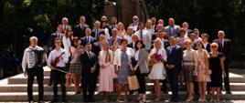 fotografia przedstawia grupowe zdjęcie właścicieli firmy INTERTECH wraz z zaproszonymi gośmi