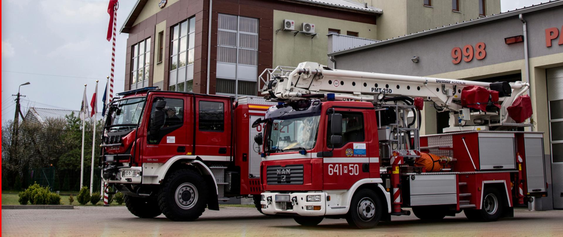 Grafika prezentująca św. Floriana gaszącego pożar oraz dwa samochody strażackie na tle sokołowskiej Komendy Powiatowej Państwowej Straży Pożarnej wraz z białym napisem "Dziękujemy za służbę!" umieszczonym na dole