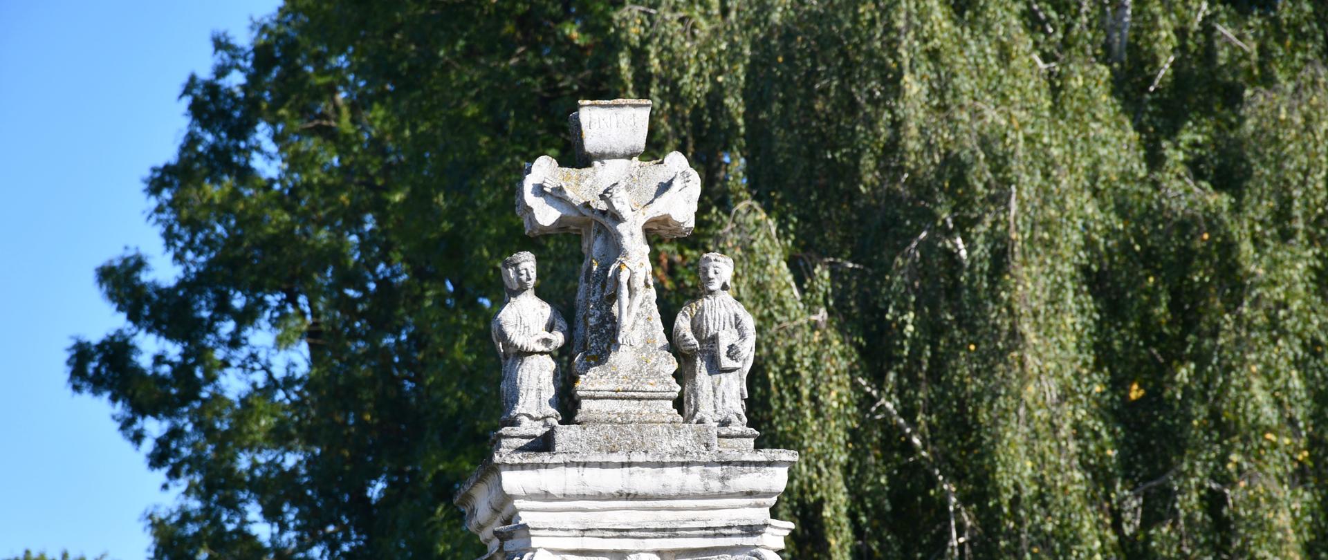 Słup kamienny z płaskorzeźbą w Gręboszowie