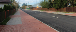 Efekt rozbudowy - nowa nawierzchnia jezdni, nowy chodnik wraz ze ścieżką rowerową