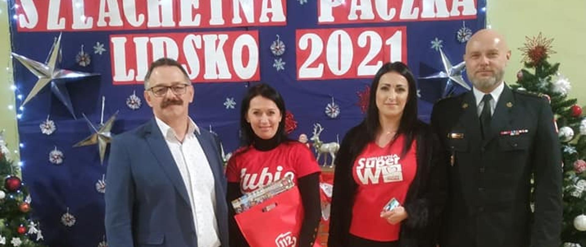 Starosta Lipski z wolontariuszkami akcji i z Zastępcą Komendanta Powiatowego PSP w Lipsku - Łukaszem Maciejewskim
