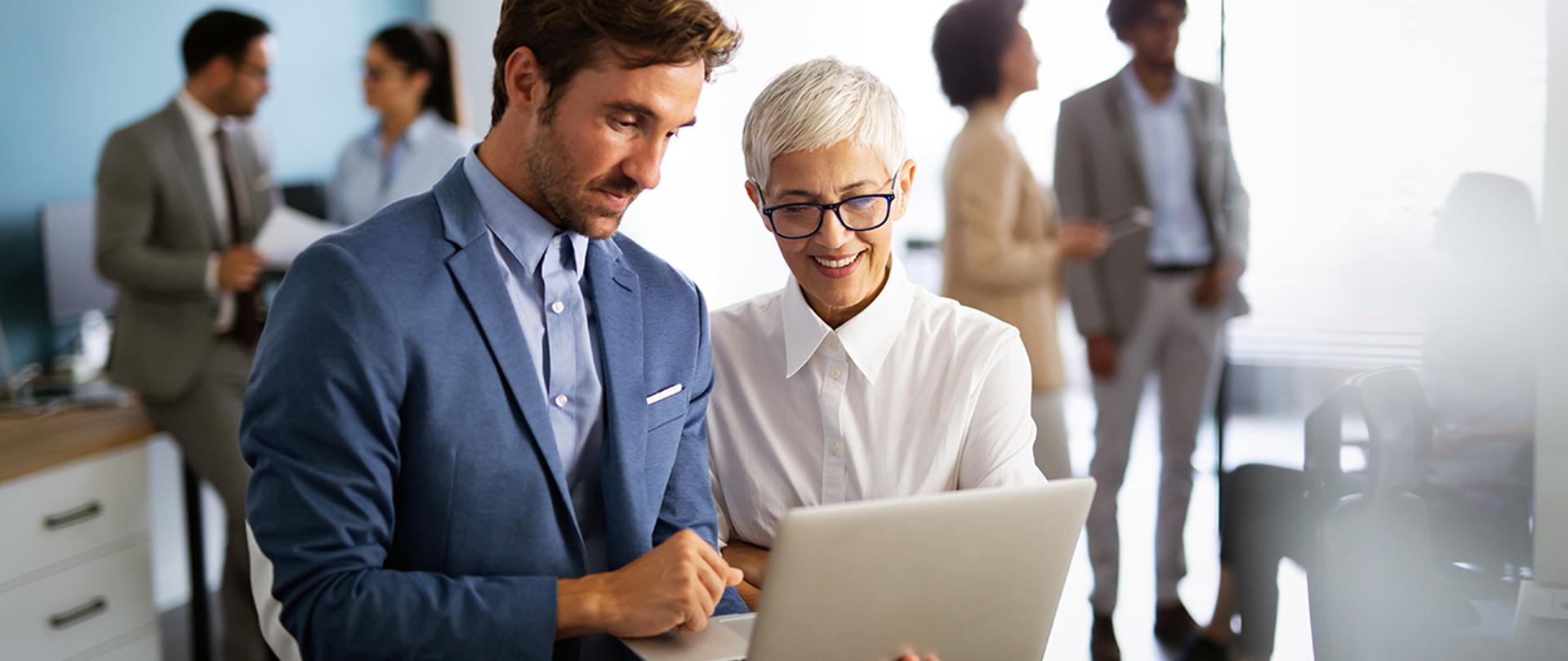 Portrait of successful business people working together in corporate office. Business teamwork concept