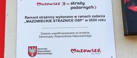 na ścianie strażnicy tablica" Mazowsze dla Straży Pożarnych Remont strażnicy wykonano w ramach zadania Mazowieckie Strażnice OSP w 2024 roku" Zadanie współfinansowane ze środków Samorządu Województwa Mazowieckiego"