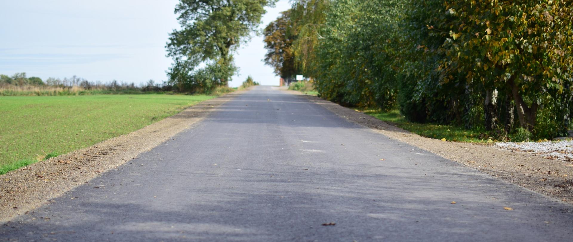 Zdjęcie przedstawia zrealizowaną inwestycję drogową