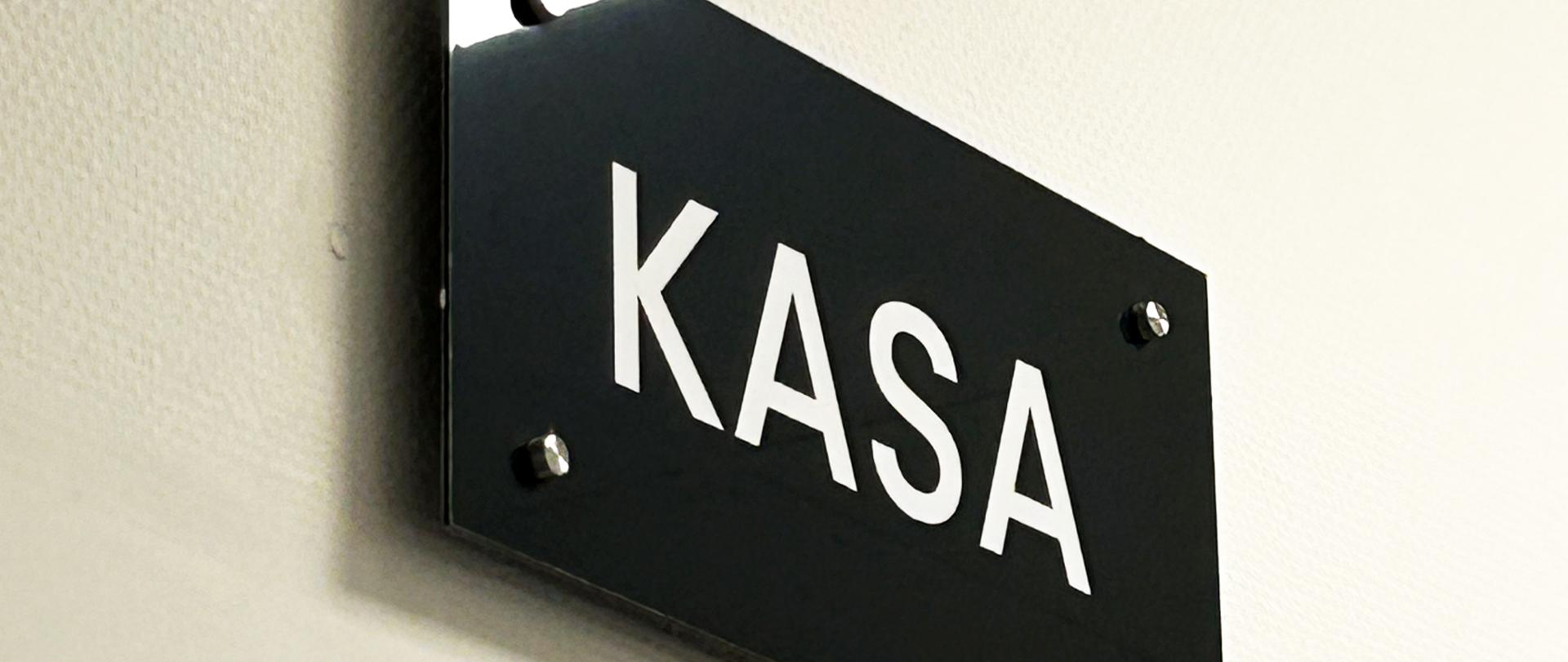 Tabliczka z napisem "KASA"