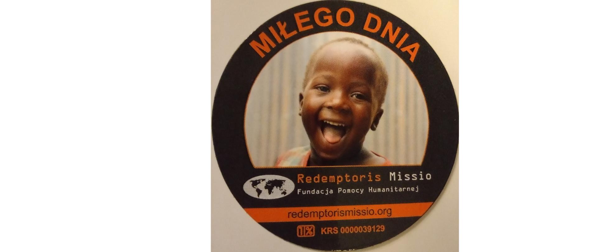 Śmiejące się dziecko. Wokół niego napis Miłego dnia, Redemptoris Missio Fundacja Pomocy Humanitarnej