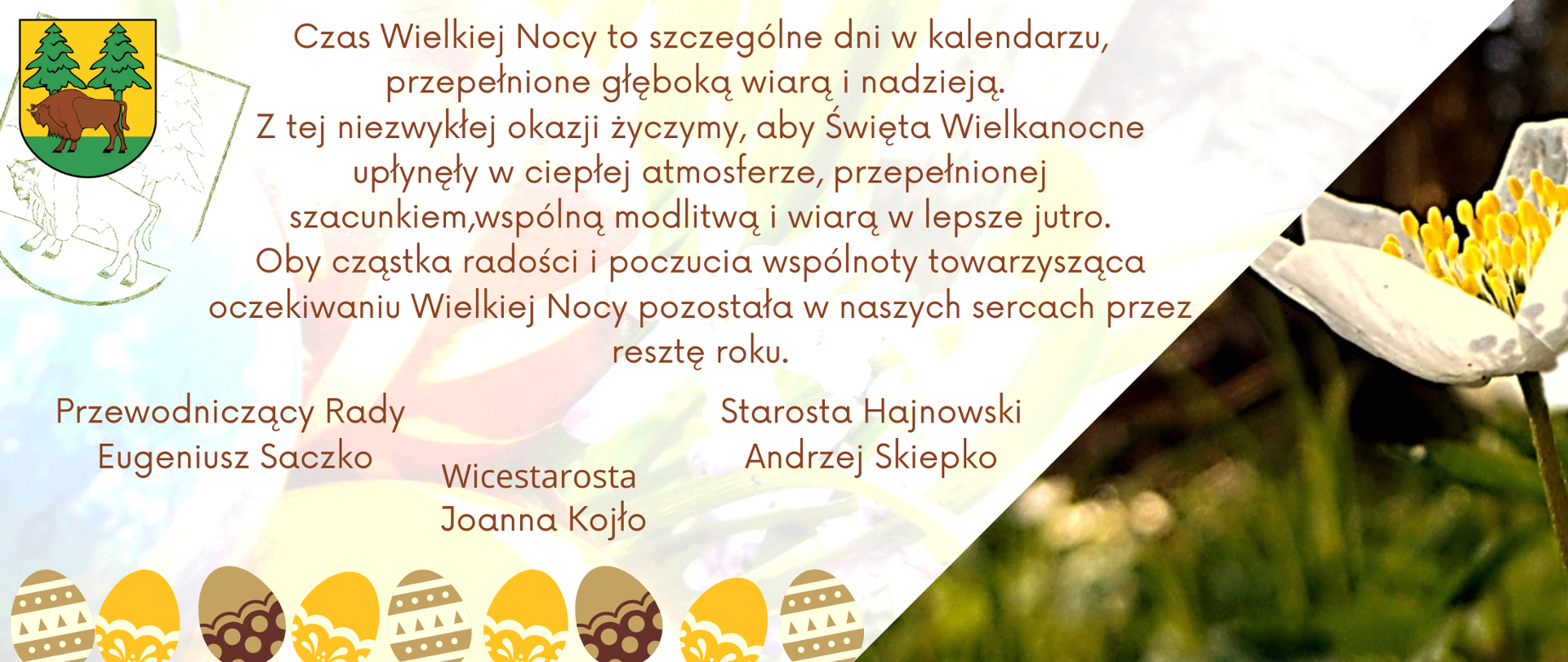 Życzenia wielkanocne o treści : Czas Wielkiej Nocy to szczególne dni w kalendarzu, przepełnione głęboką wiarą i nadzieją. Z tej niezwykłej okazji życzymy, aby Święta Wielkanocne upłynęły w ciepłej atmosferze, przepełnionej szacunkiem,wspólną modlitwą i wiarą w lepsze jutro. Oby cząstka radości i poczucia wspólnoty towarzysząca oczekiwaniu Wielkiej Nocy pozostała w naszych sercach przez resztę roku. Obok życzeń zdjęcie przylaszczki