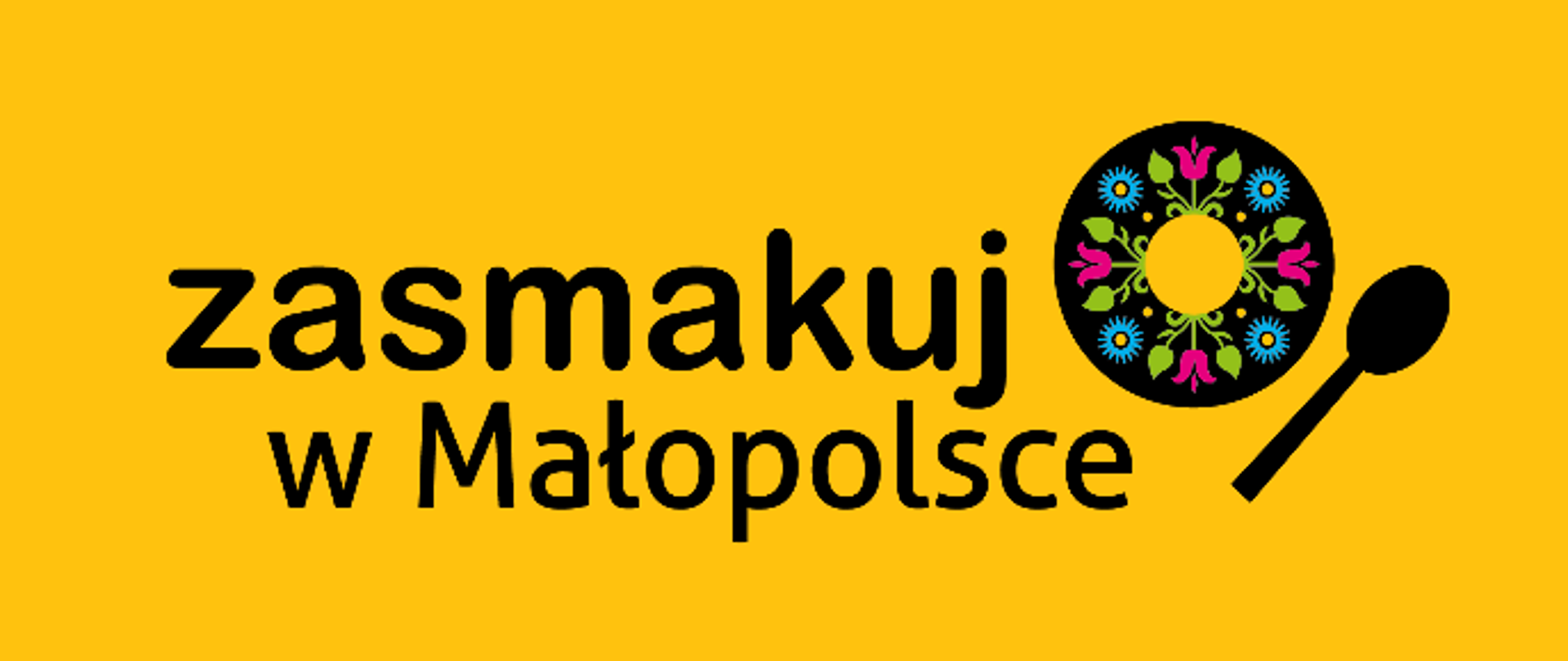 grafika przedstawia na żółtym tle czarny napis: zasmakuj w Małopolsce obok okrąg z motywem folklorystycznym i obrazek łyżki