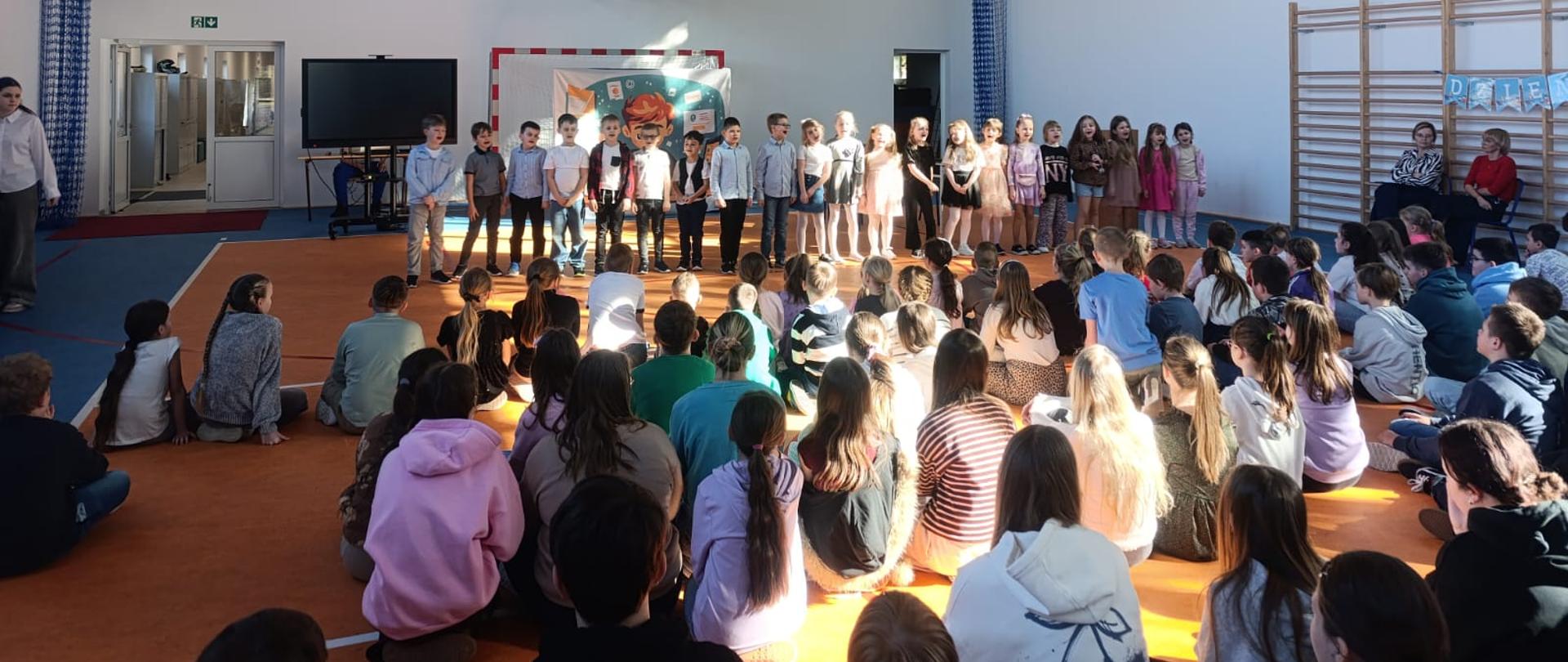 Klasa I w piosence Świat realny jest genialny