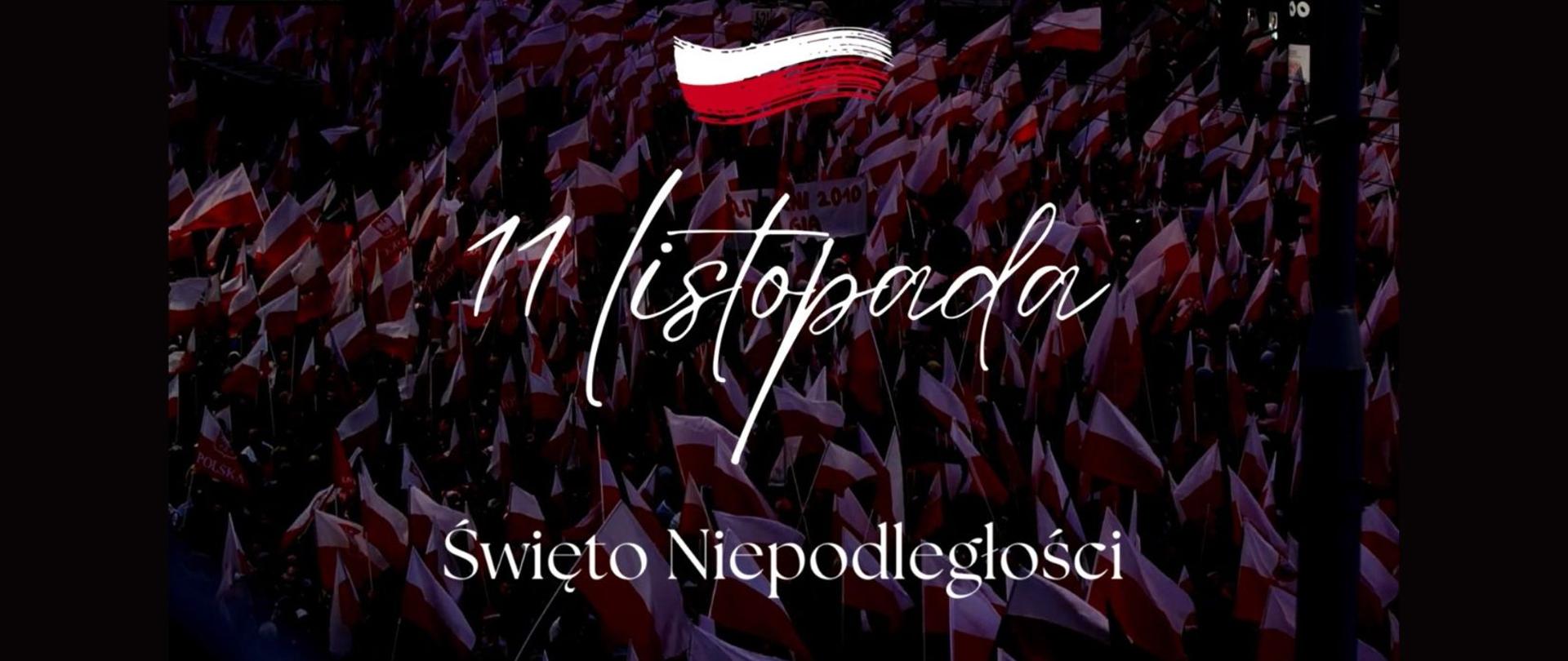 Biały napis 11 listopada - Święto Niepodległości. W tle flagi Polski.