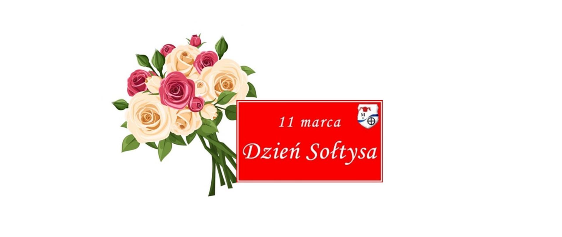 Kwiaty i tablica "11 marca - Dzień Sołtysa"