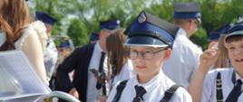 Młody członek Strażackiej Orkiestry