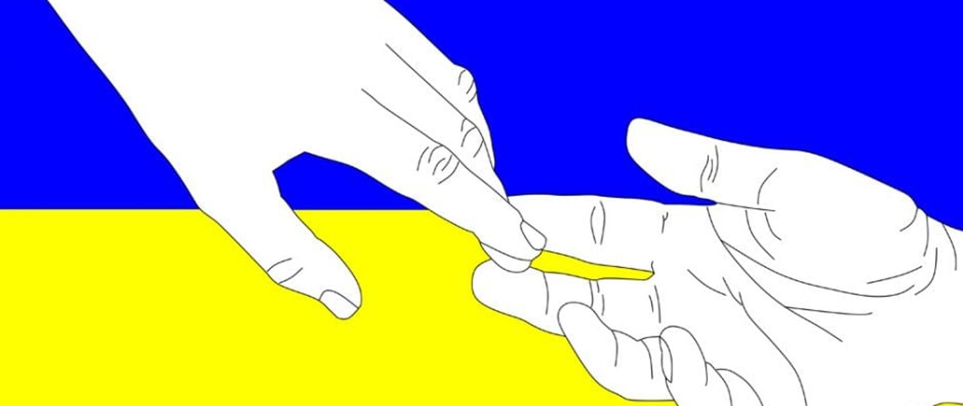 ręce na tle flagi Ukrainy