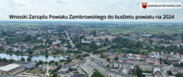 zdjęcie z lotu ptaka Miasta Zambrów na górze znajduje się tekst Wnioski Zarządu Powiatu Zambrowskiego do budżetu powiatu na 2024, w górnym prawym rogu logo powiatu z napisem powiatzambrowski.com, a w dolnym prawym rogu fot. Marcin Maciejewski