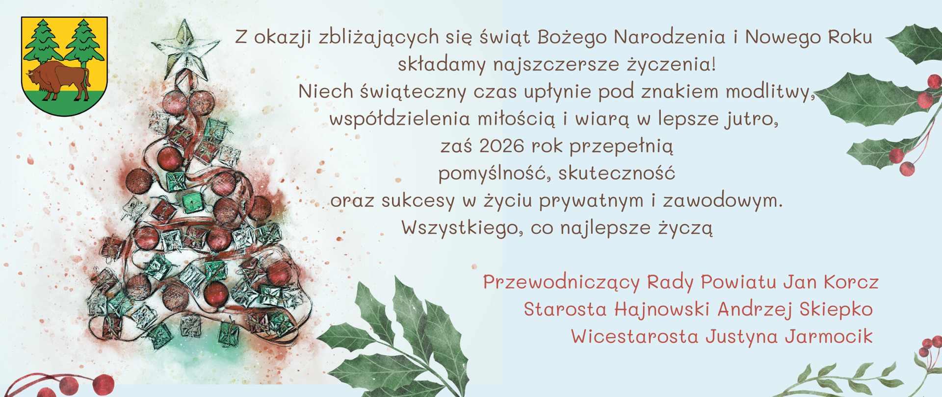 Wesołych świąt! Kartka z życzeniami od samorządu powiatu. Obok choinki i herbu powiatu, umieszczono życzenia, zawarte w artykule.