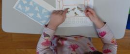 Dzieci w trakcie zajęć terapeutycznych z pedagogiem specjalnym 