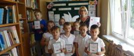Uroczyste pasowanie pierwszoklasistów
na czytelników biblioteki szkolnej