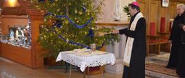 Święcenie opłatka podczas spotkania noworocznego z sołtysami