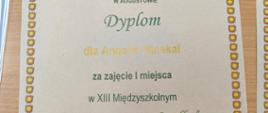 Dyplom dla Angeliki Moskal za zajęcie I miejsca w XIII Międzyszkolnym Konkursie Poetyckim ,,Strofka" w kategorii klas IV-VI.