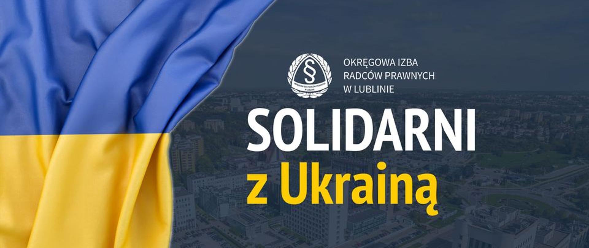 Panorama miasta, flaga ukrainy, logotyp Okręgowej Izby Radców Prawnych w Lublinie, napis Solidarni z Ukrainą