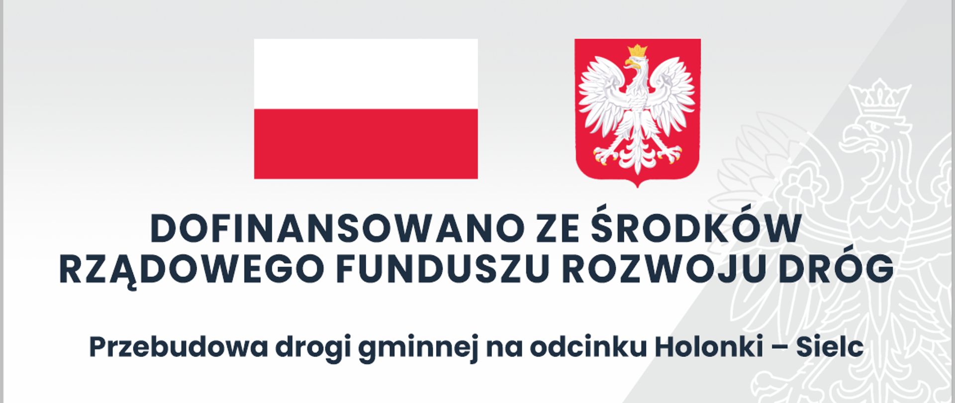 Tablica informująca o dofinansowaniu zadania pn. Przebudowa drogi gminnej na odcinku Holonki-Sielc