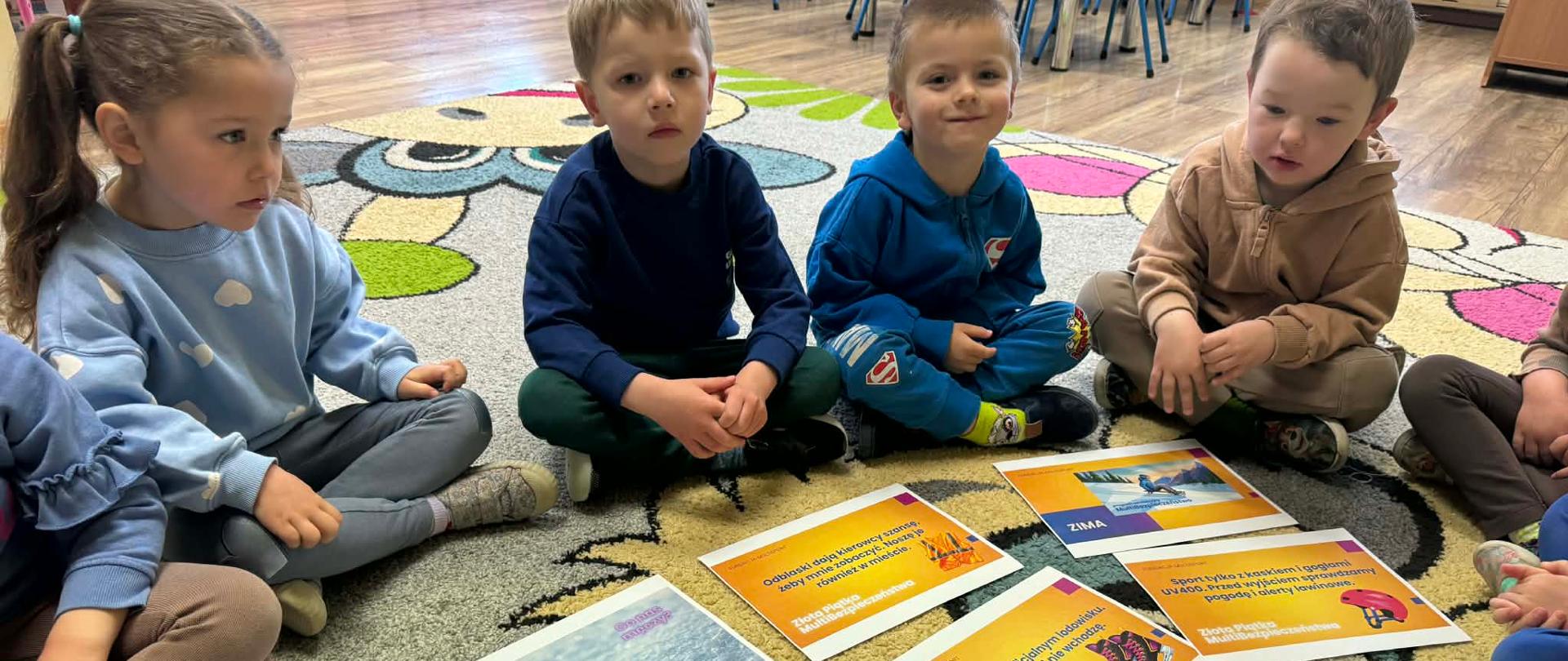 Grupa dzieci podczas zajęć edukacyjnych w ramach programu Multibezpieczeństwo