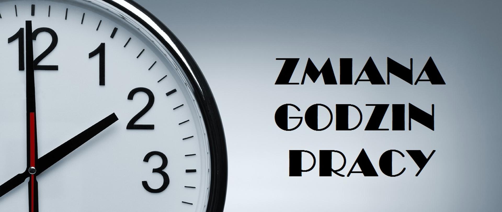 Zegar ścienny z podpisem "Zmiana godzin pracy" na szarym tle.