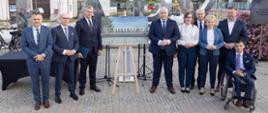 Konferencja prasowa przed napisem Łapy Fot. UMWP
