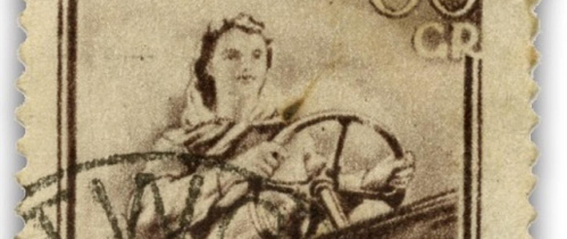 znaczek pocztowy przedstawiający kobietę kierującą traktorem